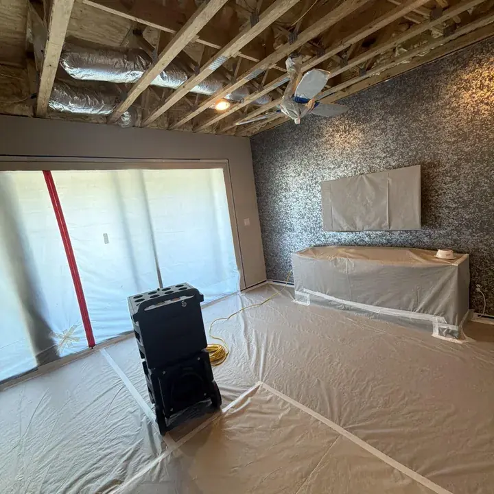 Drying equipment set up after a slab leak in a Kyle, TX home
